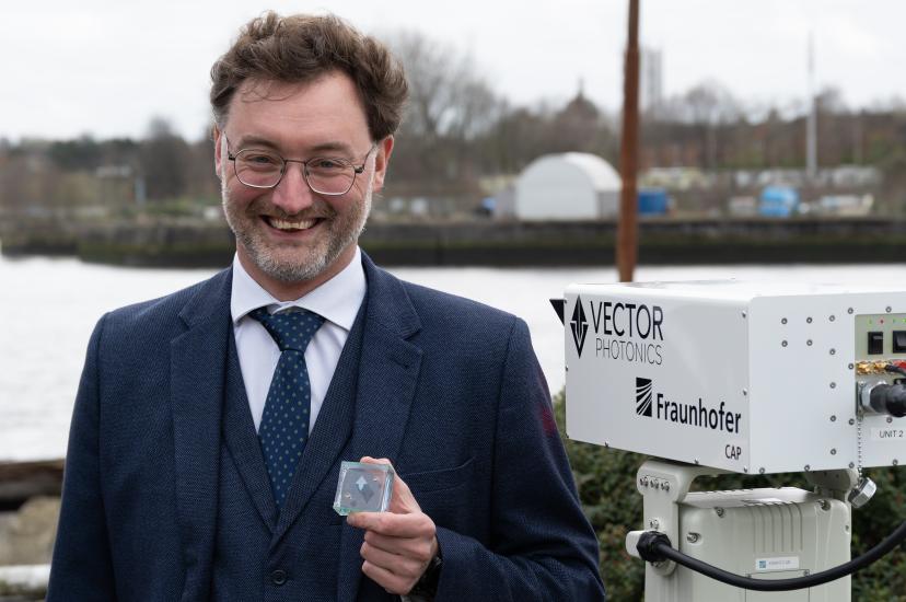 Dr Richard Taylor, CEO and Founder of Vector Photonics, with the PCSEL and optical communications system at the successful demo across the River Clyde.