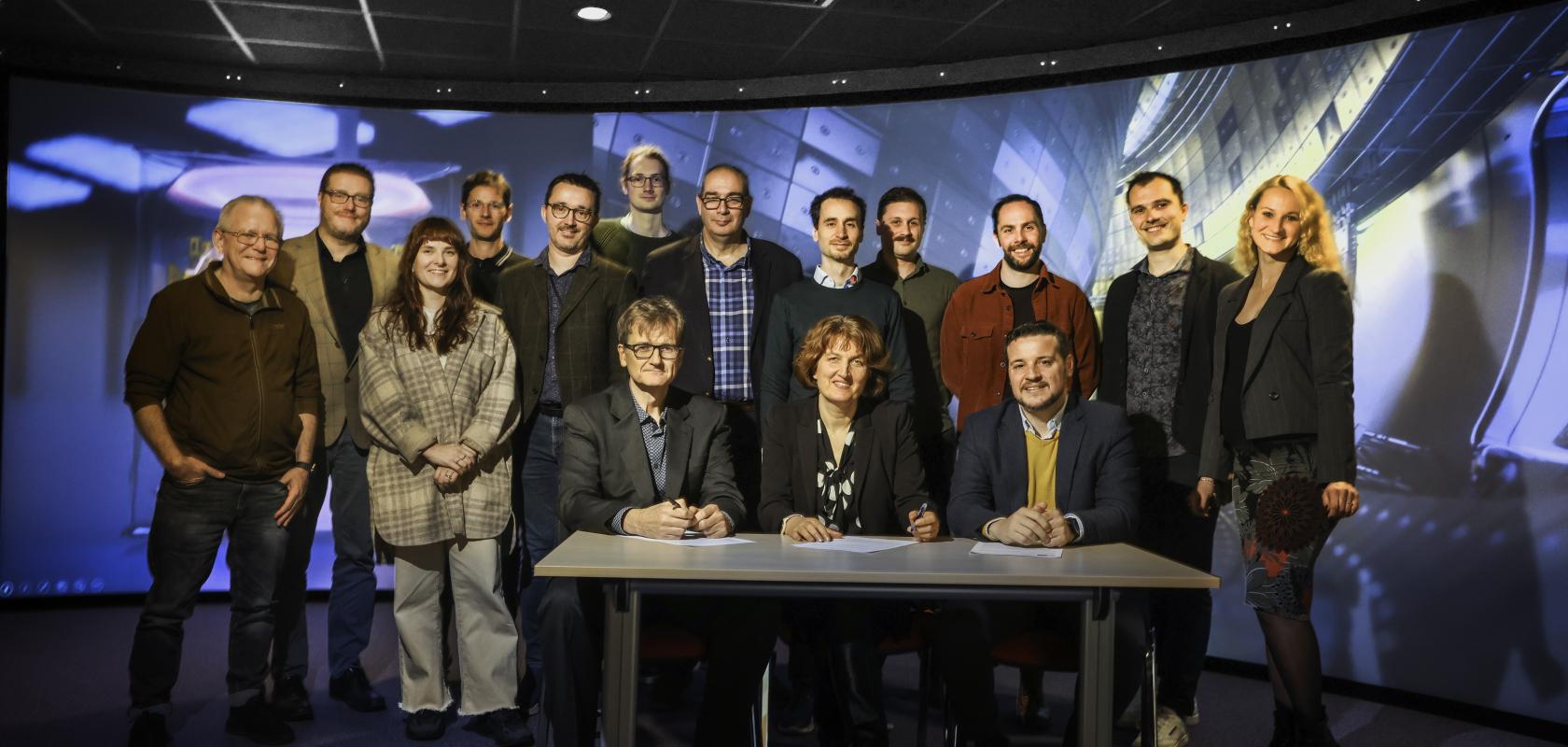 Team Team photo at signing of partnership agreement for fusion collaboration