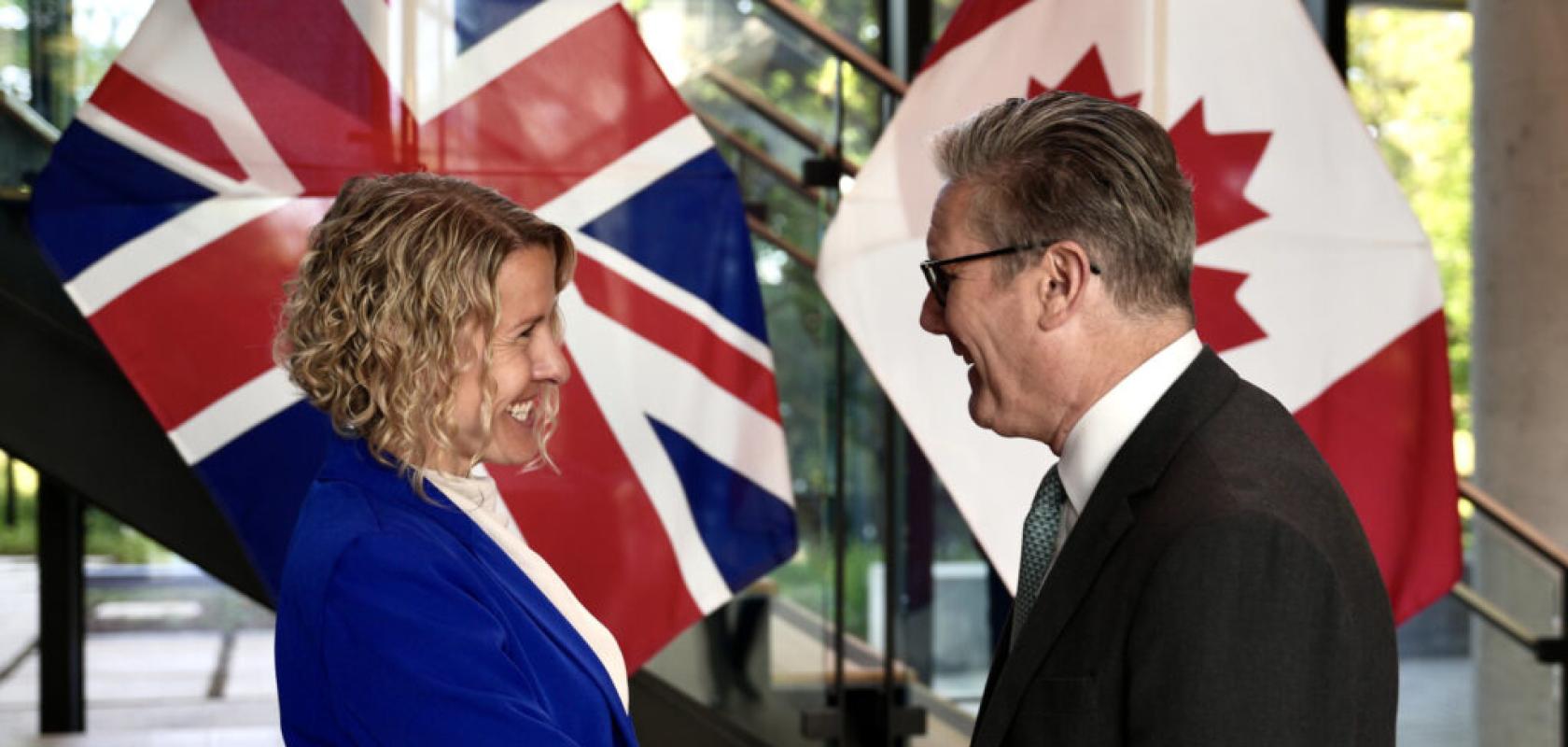 Dr. Stephanie Simmons shakes hands with UK Prime Minister Keir Starmer